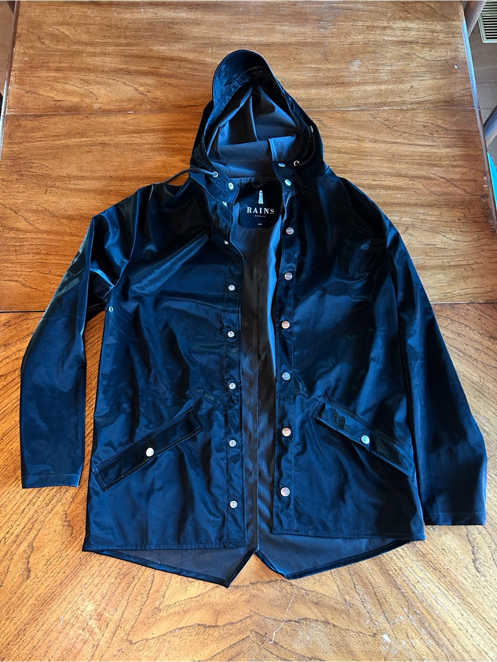 Rains iridescent/ luminous black slicker